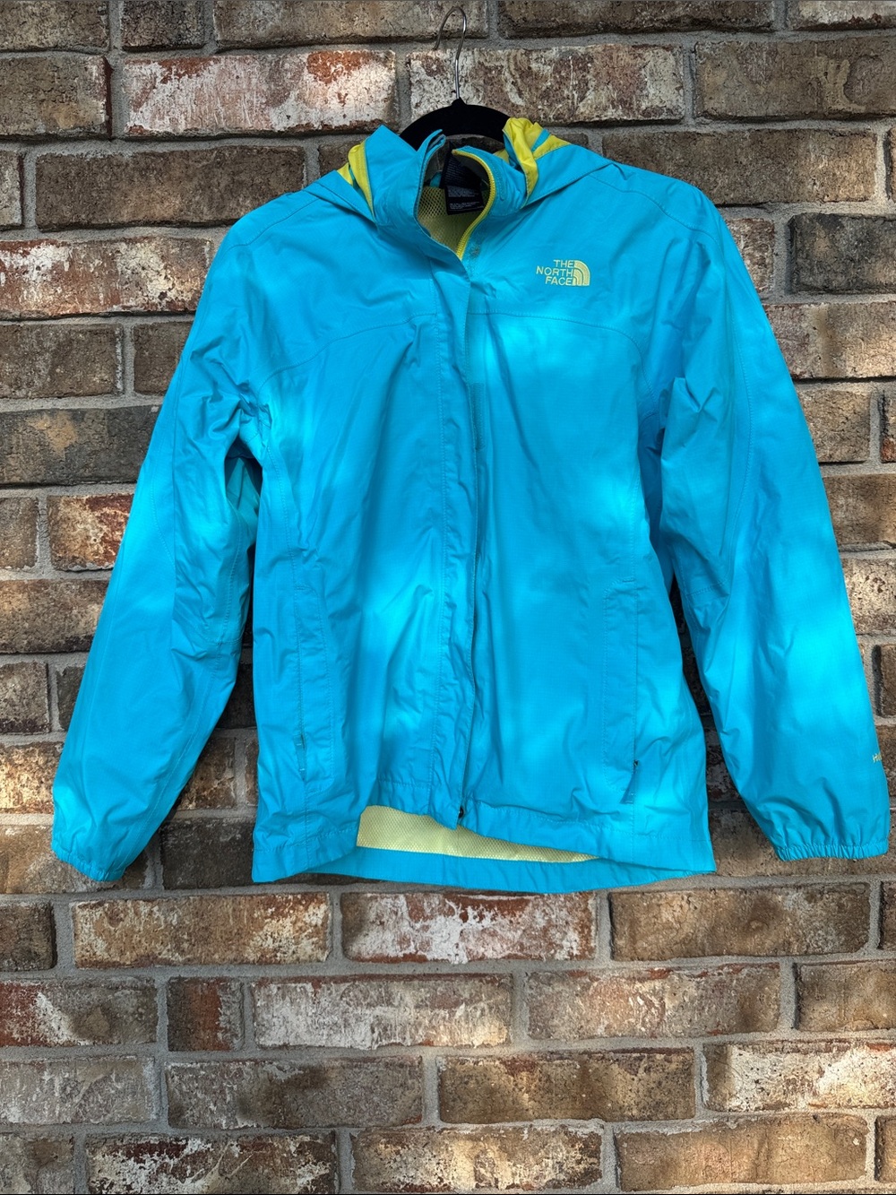 The North Face Girls Turquoise Rain Jacket with Yellow Lining size L (14-16)
